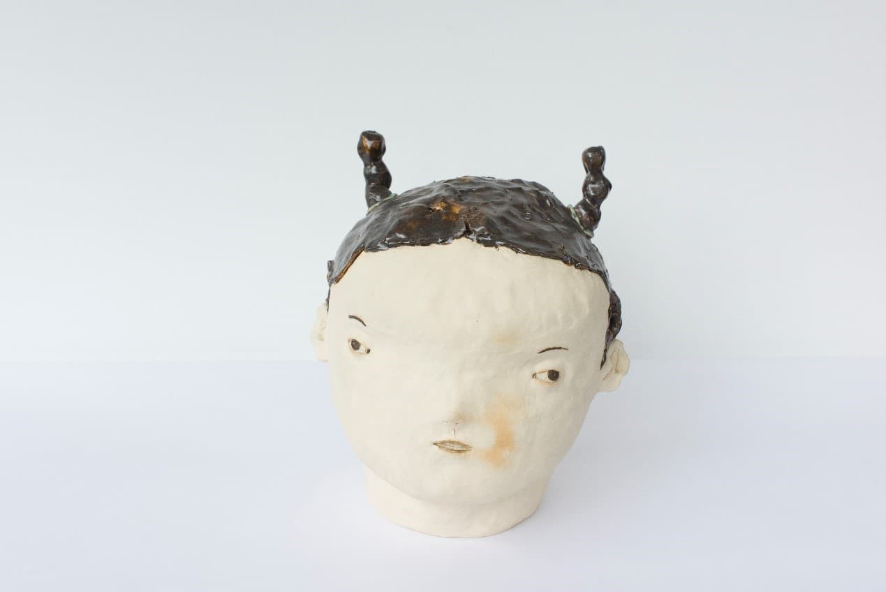 When a girl has her hair tied up